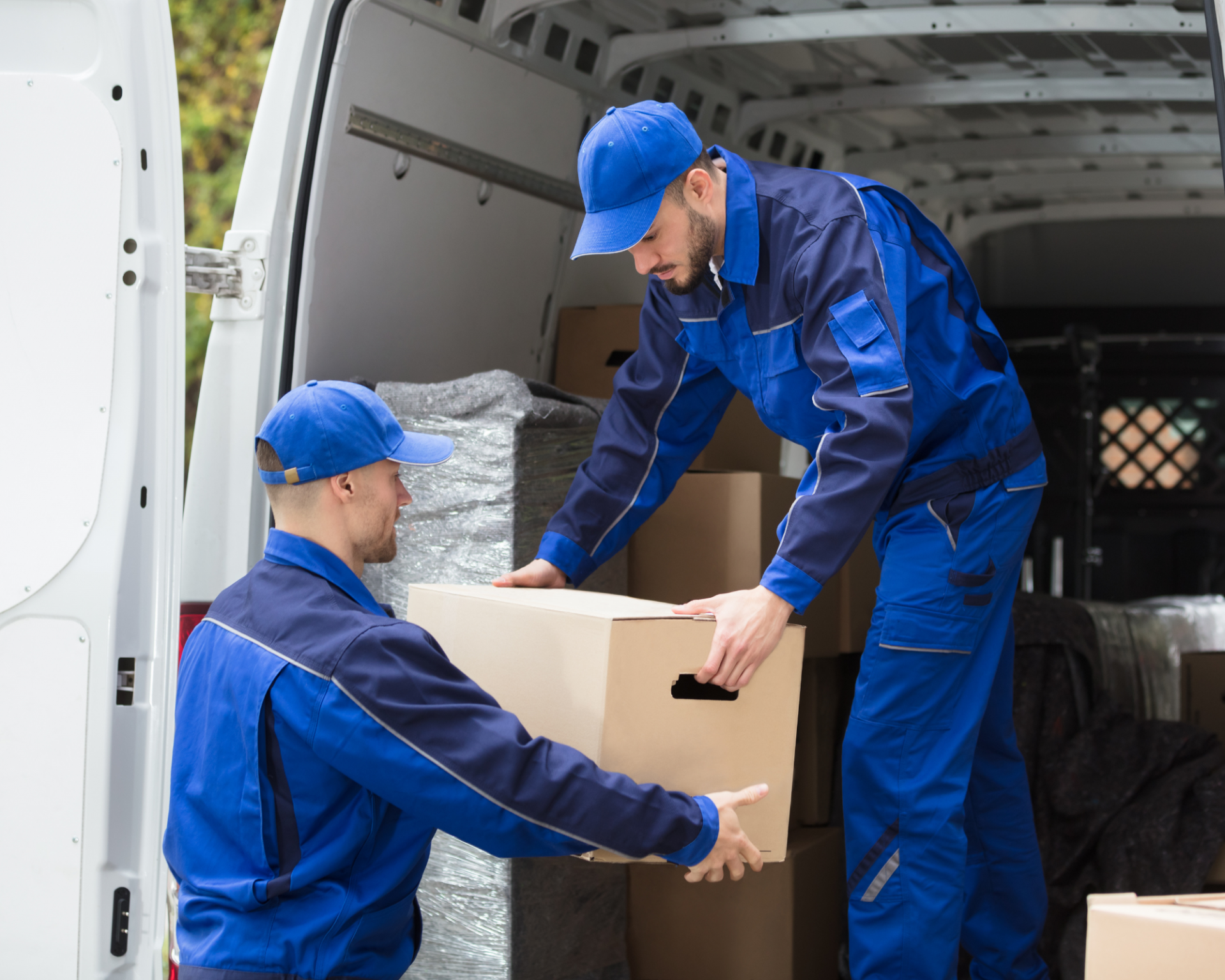 Professional movers loading a moving van