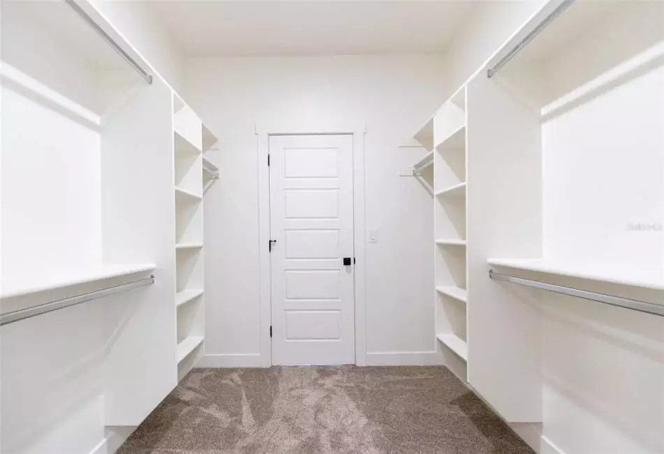 Master Bedroom Walk In Closet. Finishes, Flooring and Other Features Shown may not be included. All to be confirmed with Builder.