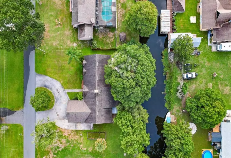 Aerial view of home and canal