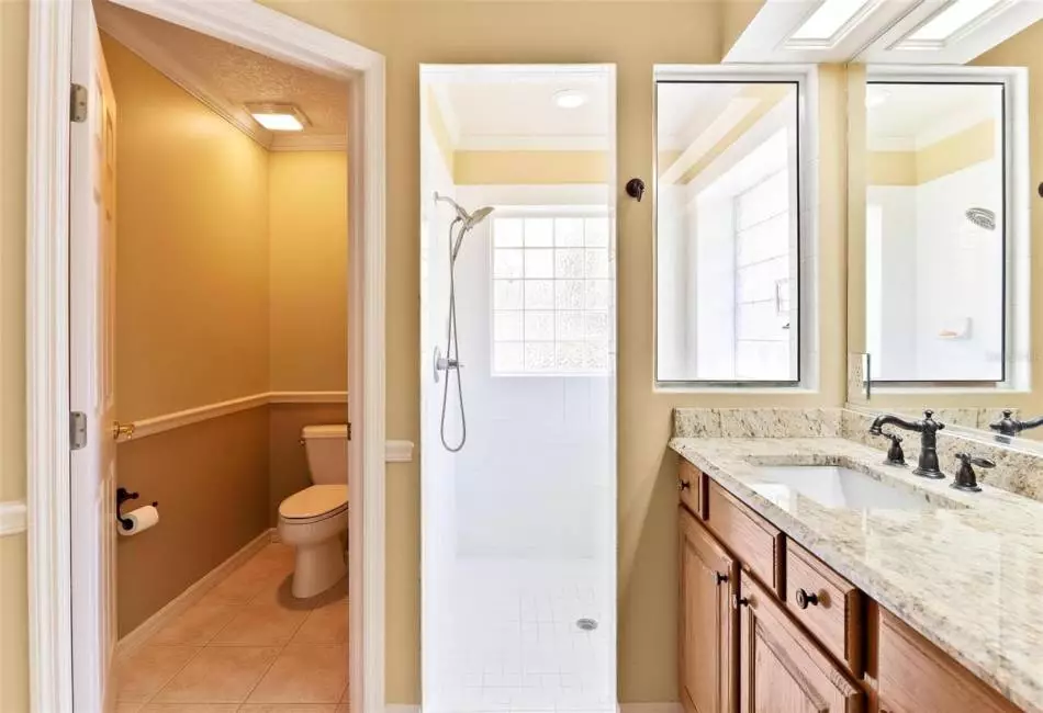 Primary Bathroom with water closet