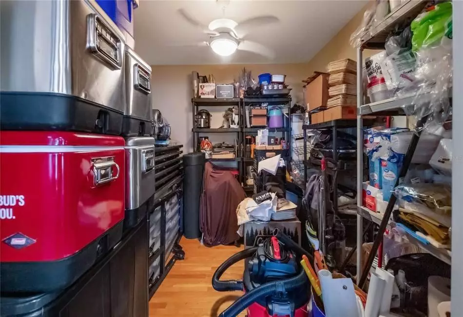 Previously was a small bedroom with built in closet, now used for storage off bar/bonus room