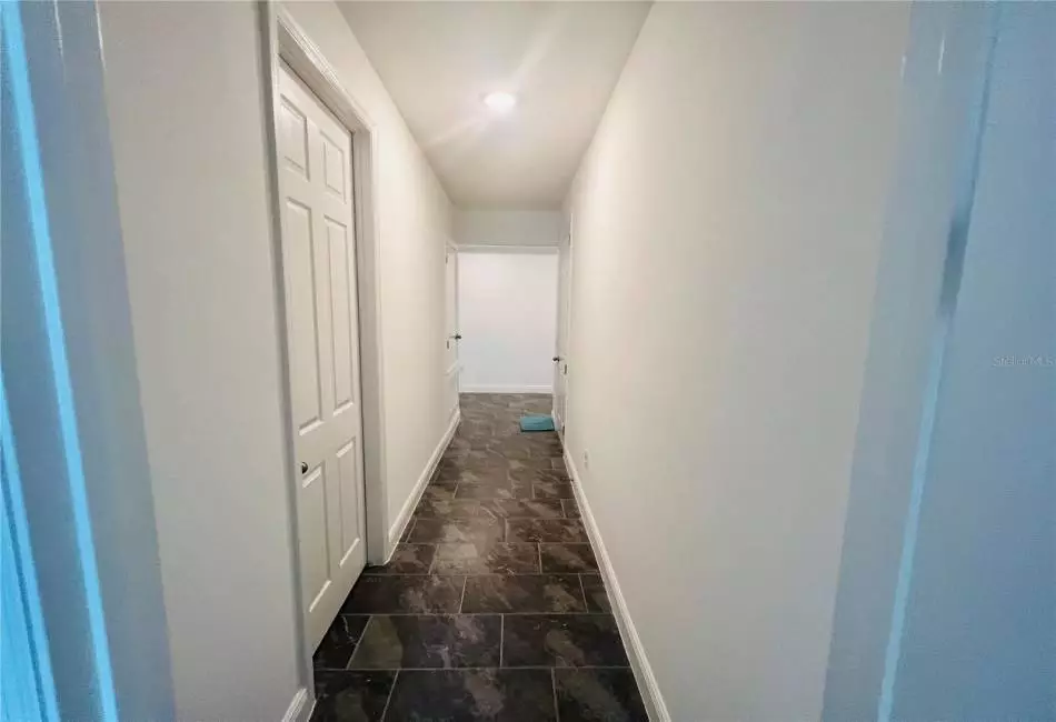 Hallway to Garage, Laundry and Room #3