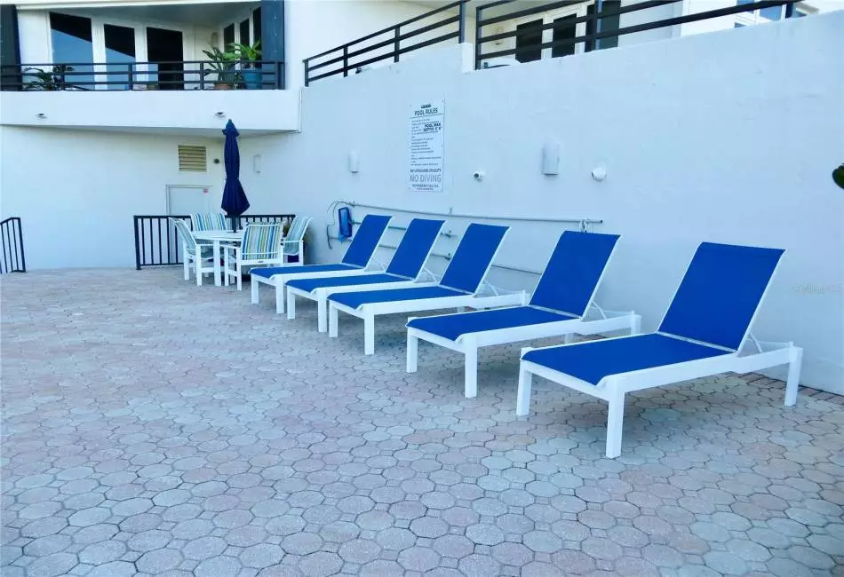 Relax on the pool deck.