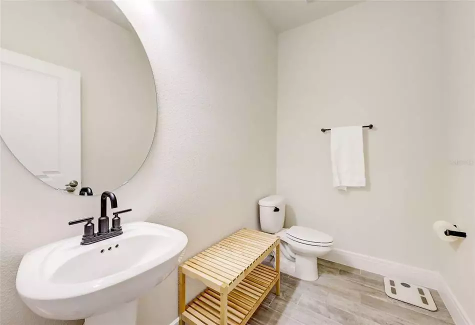 First floor powder room is perfect for guests.
