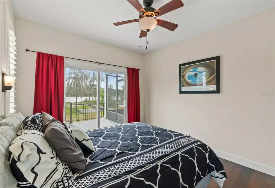 Bedroom #2 located on main floor with private balcony overlooking Horseshoe lake.