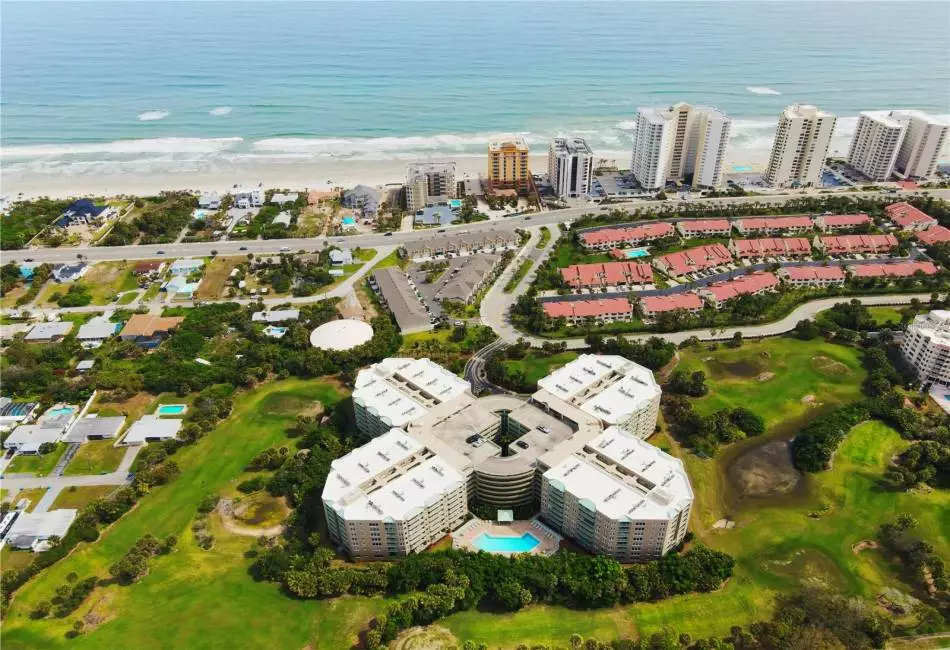 Ariel view of building and beach