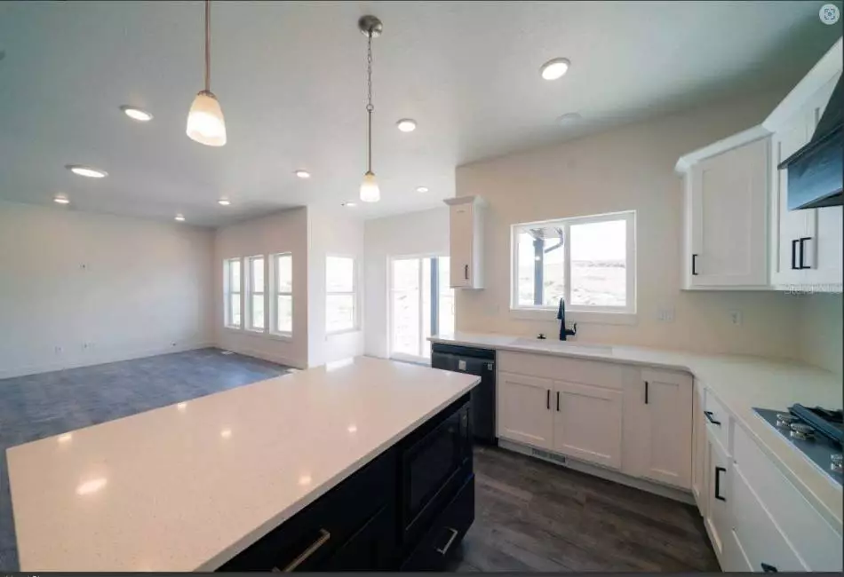 Kitchen cabinets, counter tops, Exhaust Hood, appliances and Fixtures may vary.