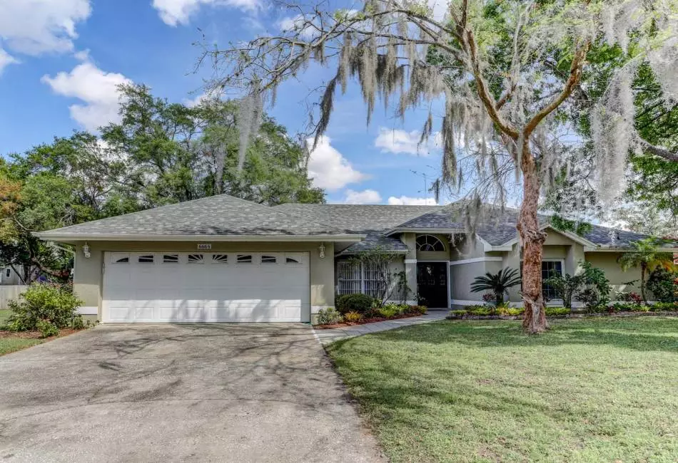 Front of the home with a 2 car garage.