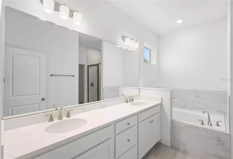 Primary Bath with Double Sinks and Soaking Tub