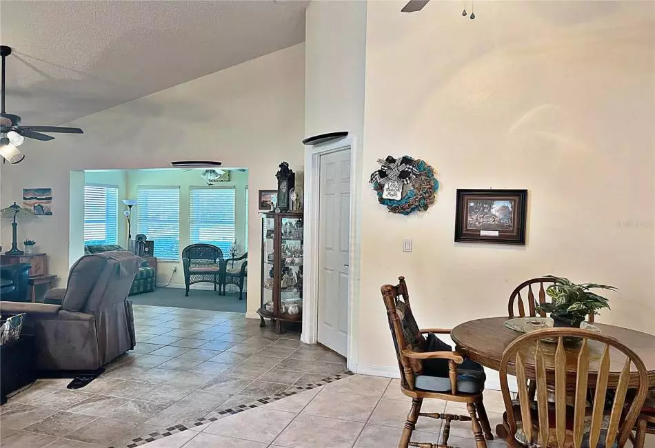 Additional view of Dining room, Living room and enclosed lanai, ceramic tile flooring