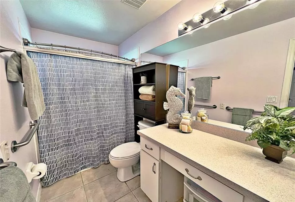 Additional view of Master bathroom, shower with glass doors, ceramic tile flooring