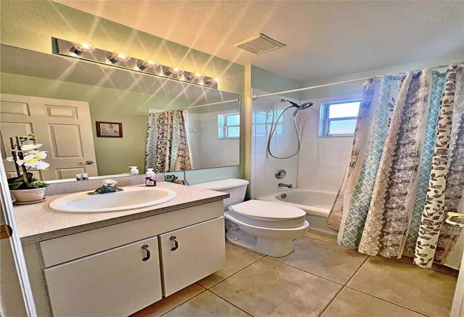 Bathroom 2 with Tub/ Shower combo, ceramic tile flooring