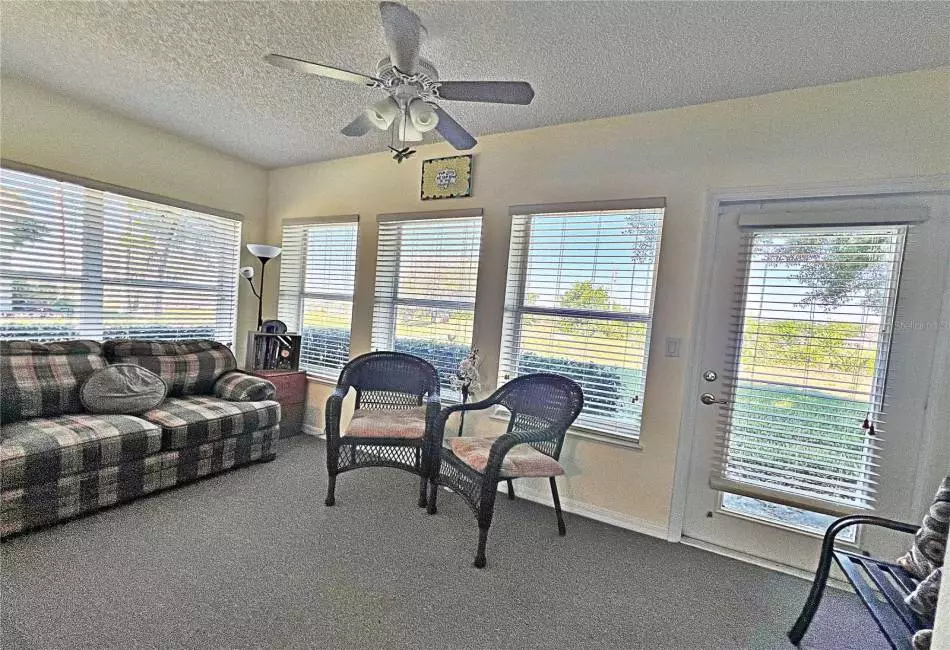 Enclosed lanai with view of golf course and no rear neighbors