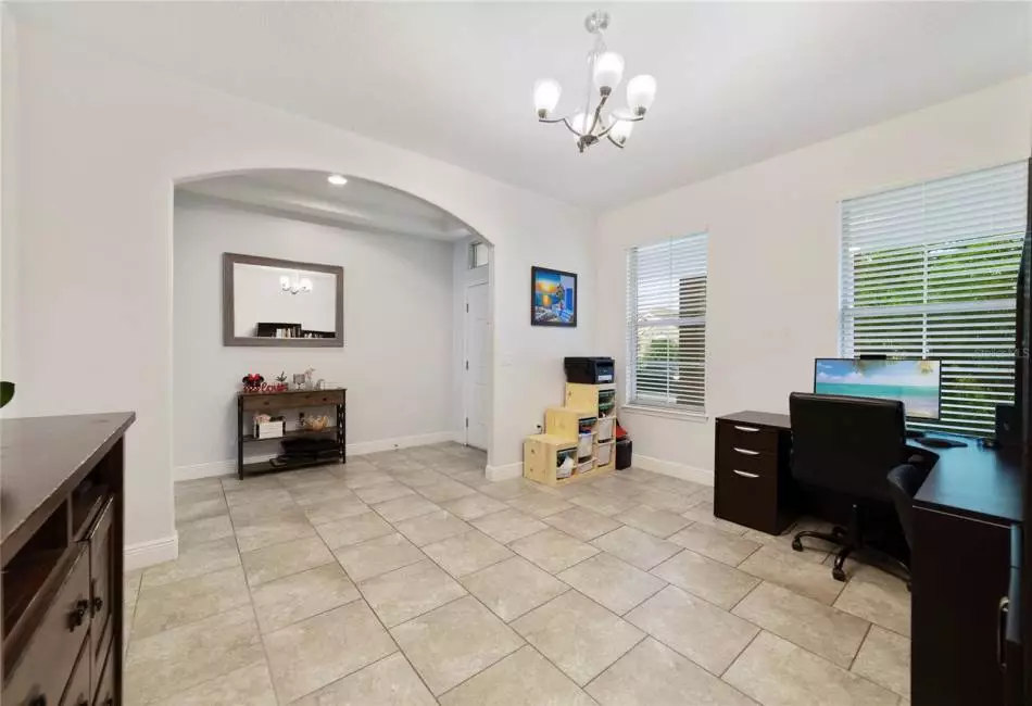 There are TILE FLOORS throughout the main living area for easy maintenance, starting in the foyer that opens up to a spacious flex room; formal dining, a home office or play area - the possibilities are endless!