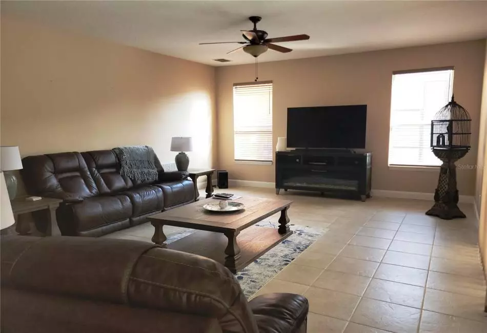 Large, modern kitchen area.  Newer stainless steel appliances.  Table and all chairs included.