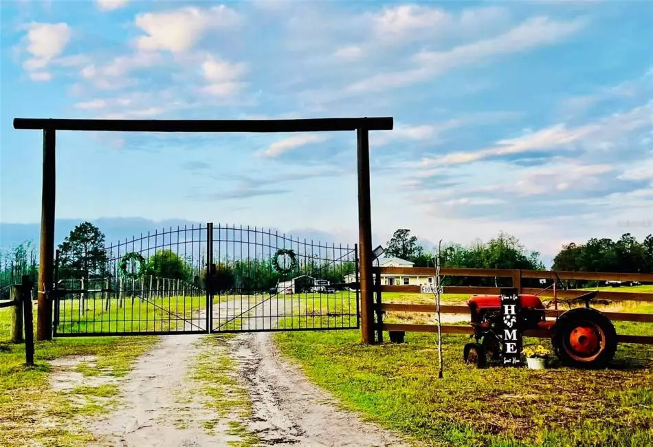 Impressive Solar Powered Double Gate, clearing 16’ in height and 18+ feet wide