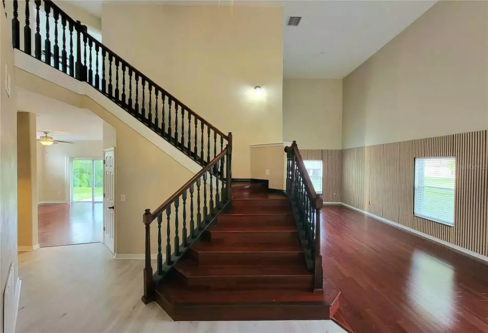 Foyer with 19 ft ceilings
