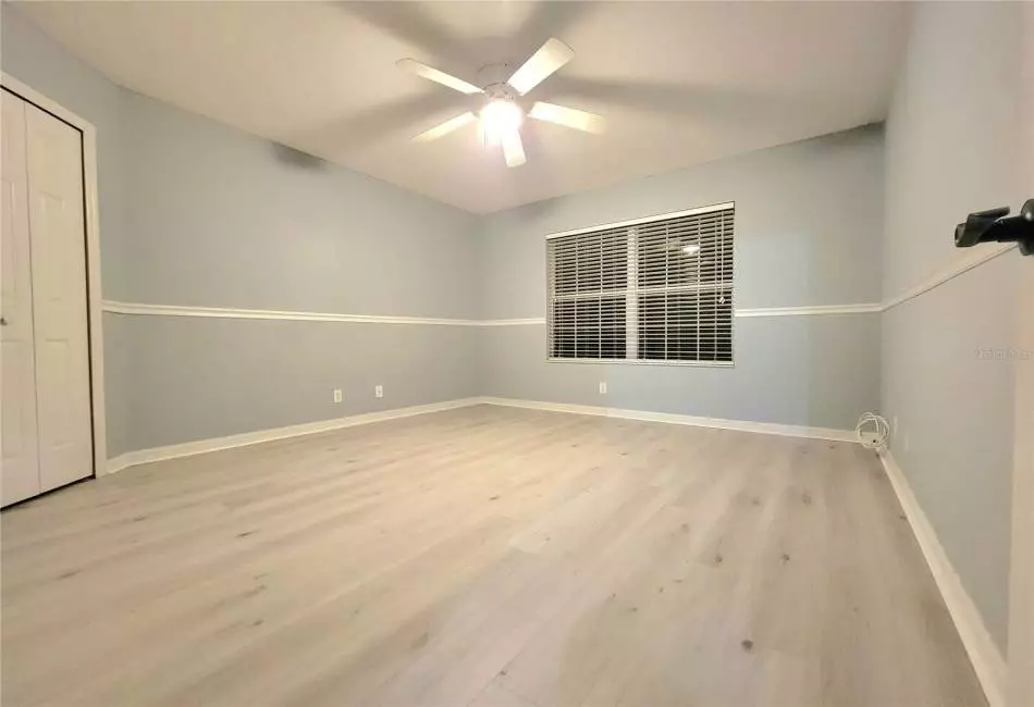 Bedroom 3 with 2 Large Spacious Closets, Ceiling Fan and Luxury LVP Floors.