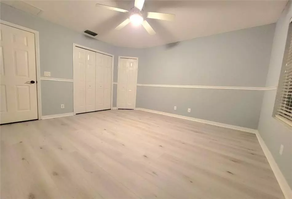 Bedroom 3 with 2 Large Spacious Closets, Ceiling Fan and Luxury LVP Floors.
