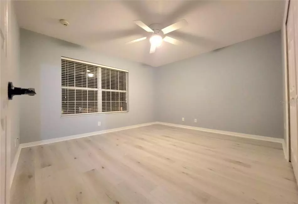 Bedroom 4 with Large Spacious Closet, Ceiling Fan and Luxury LVP Floors.