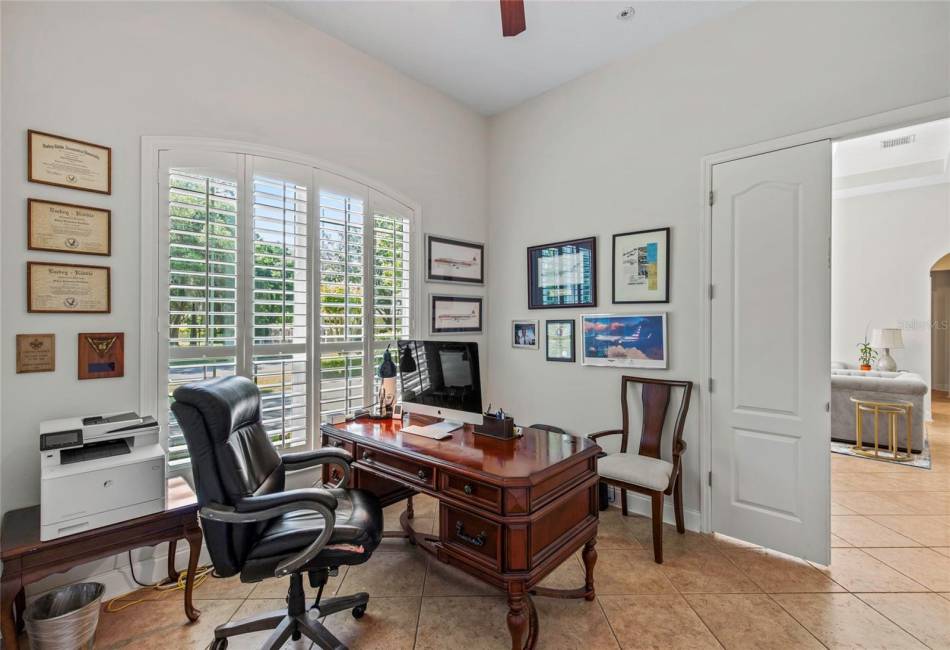 Guestroom #2 used as office with beautiful Plantaton shutters