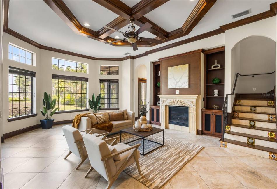 Covered lanai off main living areas, beautiful balcony above & wood inlaid ceiling