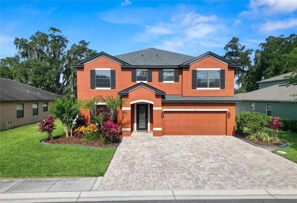 Pavers and Glass front door make a great first impression