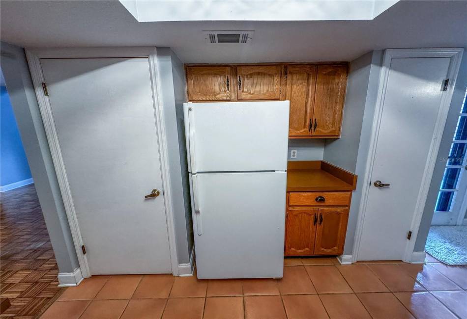 Fridge and pantry closet.