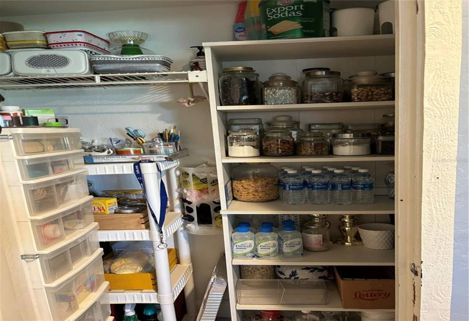 Another very organized closet off the hallway to hold essentials